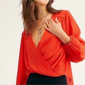 Free People Check on It Draped flame red Surplice neck long sleeve wrap blouse